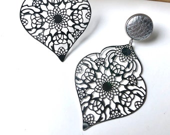 Silver filigree earrings with 12mm leather stud. Hypoallergenic stainless steel. Butterfly back.