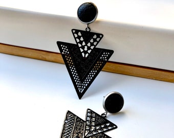 Black filigree geometric earrings with 10mm leather stud. Hypoallergenic stainless steel. Butterfly back.