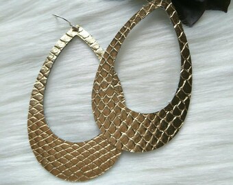 Leather Earrings- Silhouette gold snake print. Hypoallergenic sterling silver hooks. Light weight earrings.