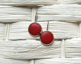 Leather Drop Studs in racy red print. Hypoallergenic surgical stainless steel bezel.