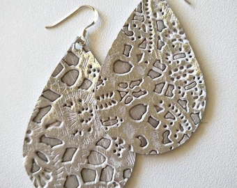 Leather Earrings- Tear Drop in silver lace print. Hypoallergenic sterling silver hooks. Light weight earrings.