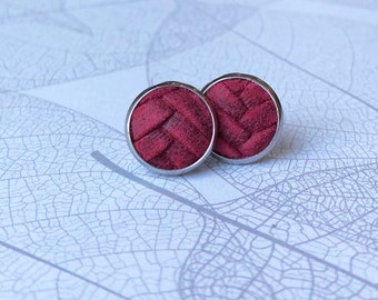 Leather studs in raspberry braided print. Hypoallergenic surgical stainless steel bezel.