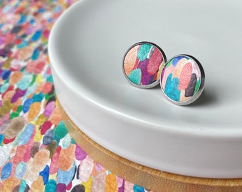 Leather studs in colourful confetti print. Colourful earrings. Hypoallergenic surgical stainless steel bezel. Rainbow studs