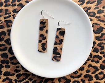 Leather earrings- Bar design in leopard print. Hypoallergenic sterling silver hooks. Light weight earrings.