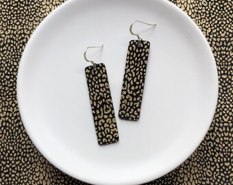 Leather earrings- Bar design in golden leopard print. Hypoallergenic sterling silver hooks. Light weight earrings.