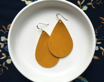 Leather Earrings- Tear Drop in mustard suede print. Hypoallergenic sterling silver hooks. Light weight earrings.
