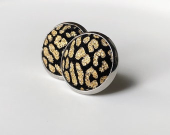 Leather studs in golden leopard print. Hypoallergenic surgical stainless steel bezel.