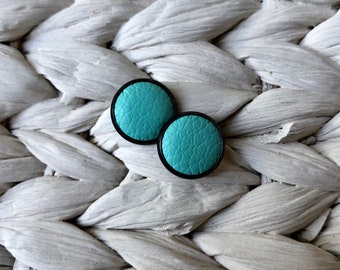 Black leather Studs in tiffany green. Hypoallergenic surgical stainless steel bezel.
