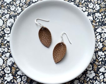 Small leaf drop earrings in caramel. Tiny tear drop. Tiny leaf earrings. Tan earrings. Leather earrings. Leather dangles. Light earrings.