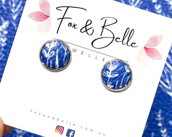 Leather studs in cobalt vine print. Hypoallergenic surgical stainless steel bezel. Blue studs. Cobalt studs. Floral studs