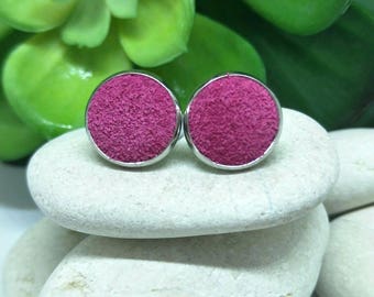 Leather studs in fushia pink suede. Hypoallergenic surgical stainless steel bezel.