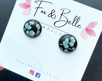 Black leather Studs in jade vine. Hypoallergenic surgical stainless steel bezel. Leaf earrings. Floral studs. Green studs.