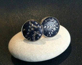 Leather studs in Navy lace print. Hypoallergenic surgical stainless steel bezel.