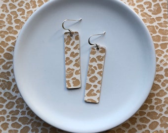 Leather earrings- Bar design in savannah leopard print. Hypoallergenic sterling silver hooks. Light weight earrings.