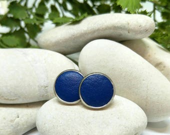 Leather studs in royal blue print. Hypoallergenic surgical stainless steel bezel.
