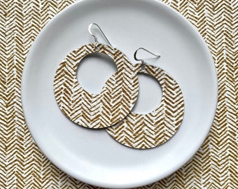 Leather earrings - The Eclipse in gold chevron. Gold earrings. Round earrings. Hypoallergenic sterling silver hooks. Light weight earrings.