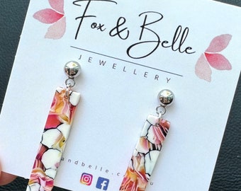 Resin earrings. Slim dangle studs in floral. Floral dangle earrings. Resin earrings. Pink earrings.