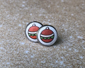 Leather studs in Christmas Bauble print. Hypoallergenic surgical stainless steel bezel.