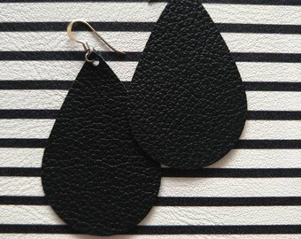 Leather Earrings- Tear Drop black beauty print. Hypoallergenic sterling silver hooks. Light weight earrings.