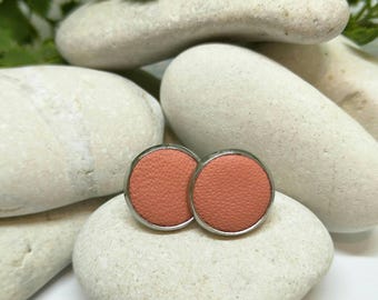 Leather studs in peach print. Hypoallergenic surgical stainless steel bezel.