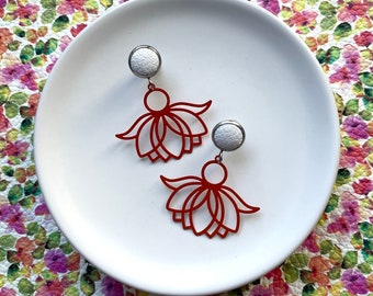 Orange floral lily dangle earrings with 10mm leather stud. Hypoallergenic stainless steel. Orange dangle earrings. Flower earrings.