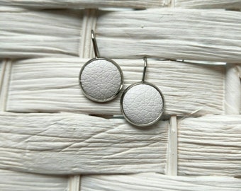 Leather Drop Studs in white print. Hypoallergenic surgical stainless steel bezel.