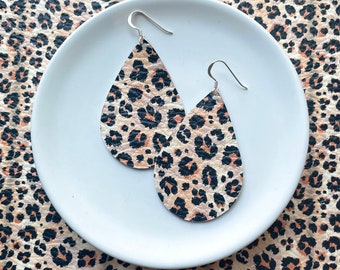 Leather Earrings- Tear Drop peach, tan and orange leopard print. Hypoallergenic sterling silver hooks. Light weight earrings. Leopard print.