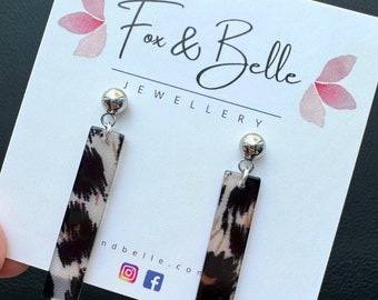 Resin earrings. Slim dangle studs in cheetah. Leopard dangle earrings. Resin earrings.