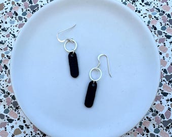 Dainty dangles in black beauty. Leather dangle earrings. Light weight earrings. Black earrings. Hoop earrings.