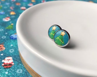 Leather studs in Christmas tree print. 10mm. Hypoallergenic surgical stainless steel bezel.