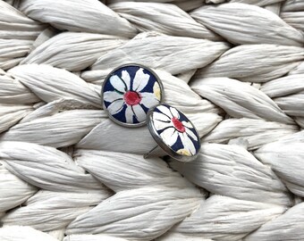 Sunny floral leather studs. Hypoallergenic surgical stainless steel bezel. Choose from 4 styles. LIMITED RELEASE!