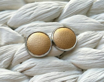 Leather studs in pearlised gold print. Hypoallergenic surgical stainless steel bezel.