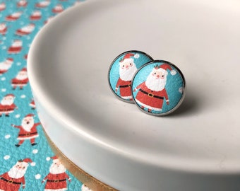 Leather studs in Santa in the snow. 14mm. Hypoallergenic surgical stainless steel bezel.