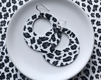 Leather earrings - The Eclipse in arctic leopard. Round earrings. Hypoallergenic sterling silver hooks. Light weight earrings.