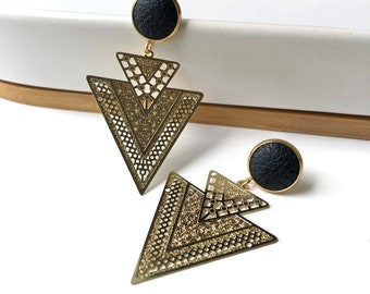Gold filigree geometric earrings with 12mm black leather stud. Hypoallergenic stainless steel. Butterfly back.