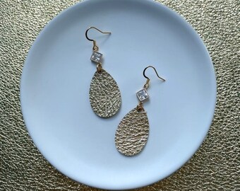 Cubic zirconia dangle earrings in gold. Bling earrings. Crystal earrings. Gem earrings. Light weight earrings. Leather earrings.