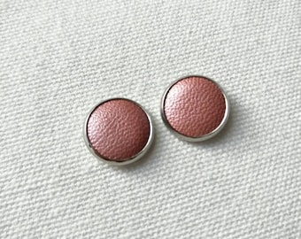 Leather studs in lip gloss pink print. Hypoallergenic surgical stainless steel bezel.