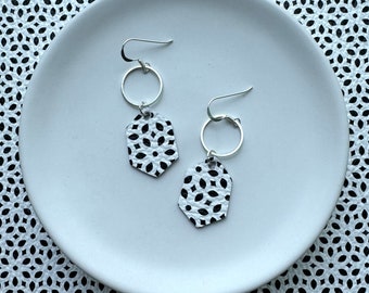 Leather earrings. Black and white fleck Stella dangle earrings. Sterling silver hooks. Light weight. Leather dangles. Monochrome earrings.