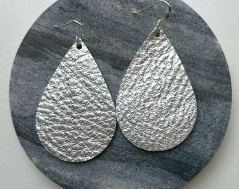 Leather Earrings- Tear Drop silver print. Hypoallergenic sterling silver hooks. Light weight earrings.