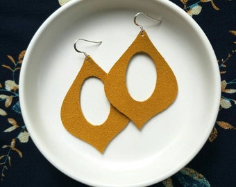 Leather Earrings- Genie shape in mustard suede print. Hypoallergenic sterling silver hooks. Light weight earrings.