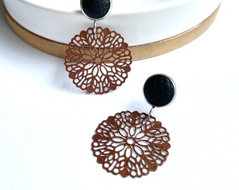 Black and bronze flower mandala dangle earrings with 10mm leather stud. Hypoallergenic stainless steel. Black and bronze dangle earrings.
