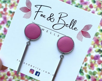 Bar Studs featuring a 12mm leather stud with a stainless steel silver bar. Choose the leather you would like. All hypoallergenic.
