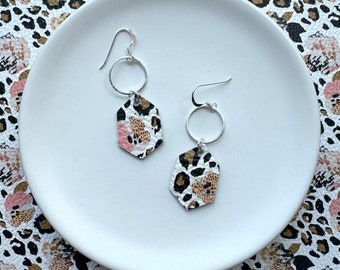 Leather earrings. Pansies and leopard Stella dangle earrings. Sterling silver hooks. Light weight. Leather dangles. Leopard earrings.