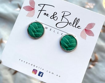 Leather studs in emerald braided print. Hypoallergenic surgical stainless steel bezel. Emerald studs. Braided studs.