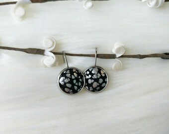 Leather Drop Studs in black with silver spots. Hypoallergenic surgical stainless steel bezel.