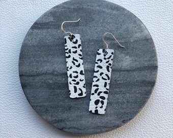 Leather earrings- Bar design in snow leopard print. Hypoallergenic sterling silver hooks. Light weight earrings.