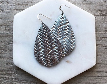 Leather Earrings- Tear Drop Silver Braided print. Hypoallergenic sterling silver hooks. Light weight earrings.