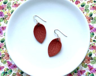 Small leaf drop earrings in persimmon orange. Tiny tear drop. Tiny leaf earrings. Leather earrings. Leather dangles. Light earrings.