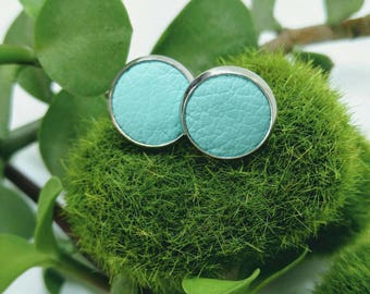 Leather studs in tiffany green print. Hypoallergenic surgical stainless steel bezel.