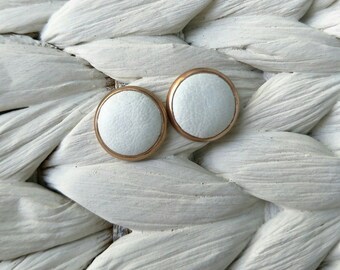 Rose Gold Leather studs in white. Hypoallergenic surgical stainless steel bezel.